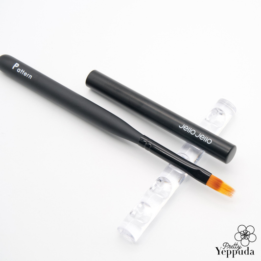 Detailed image of a flexible brush featuring the JELLO JELLO brand, designed for precise gradation and intricate pattern drawing with nuanced gel.