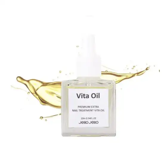 A bottle of premium extra nail treatment oil called Jello Jello Vita Oil, containing a blend of nourishing ingredients like Vitamin E, avocado, and olive oil to revitalize dry, brittle nails and restore their natural shine. The 10 mL bottle is displayed against a white background with splashes of the golden oil visible, highlighting the product's high-quality formulation and intended benefits for nail care and beauty.