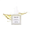 A bottle of premium extra nail treatment oil called Jello Jello Vita Oil, containing a blend of nourishing ingredients like Vitamin E, avocado, and olive oil to revitalize dry, brittle nails and restore their natural shine. The 10 mL bottle is displayed against a white background with splashes of the golden oil visible, highlighting the product's high-quality formulation and intended benefits for nail care and beauty.