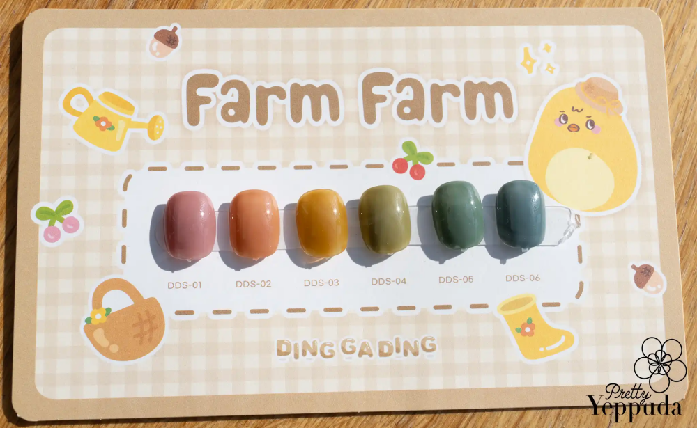 Detailed and whimsical rolling bottles representing the "JIN.B Ding Gading - 6 PC collection" from the Shopify product, featuring a festive farm-themed design with adorable graphics and a color chart for the six-piece set, suitable for SEO optimization and brand enhancement.