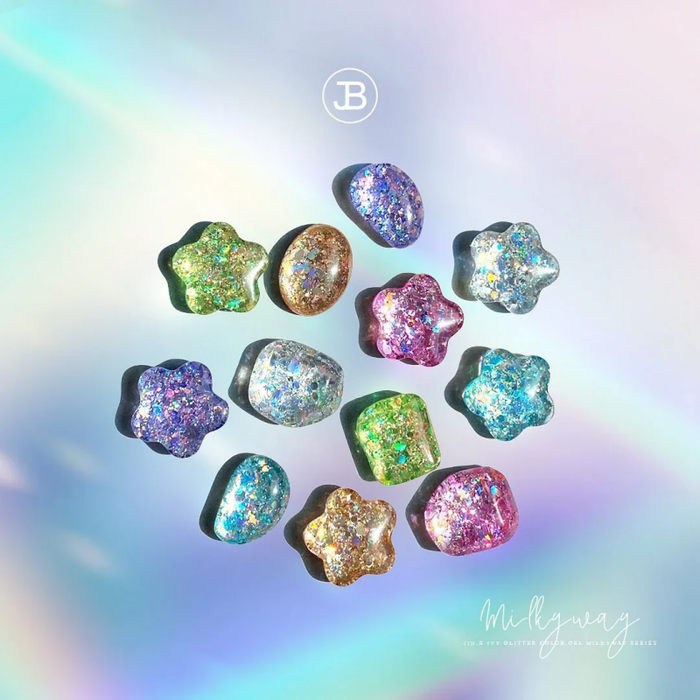 Mystical glitter gels in a celestial array, showcasing the stunning Milky Way Collection by Jin.B. These vibrant, iridescent hues capture the essence of the cosmos, leaving a dazzling, galactic impression. Shopify product imagery that evokes a sense of wonder and enchantment.