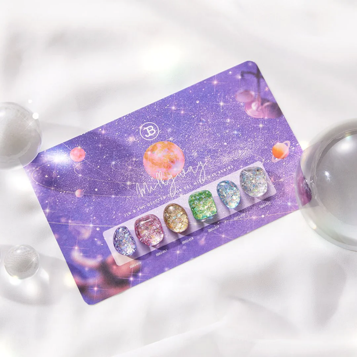 Elegant and enchanting glitter gel collection with a mesmerizing cosmic design, featuring the Jin.B brand's signature sparkly and luminous aesthetic.