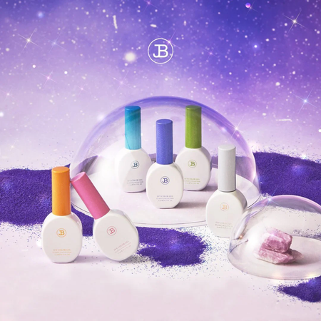 A display of the JIN.B Milky Way Collection, featuring 6 vibrant and glittering gel nail polishes in a captivating galactic-inspired setting, complete with a color chart and packaging.