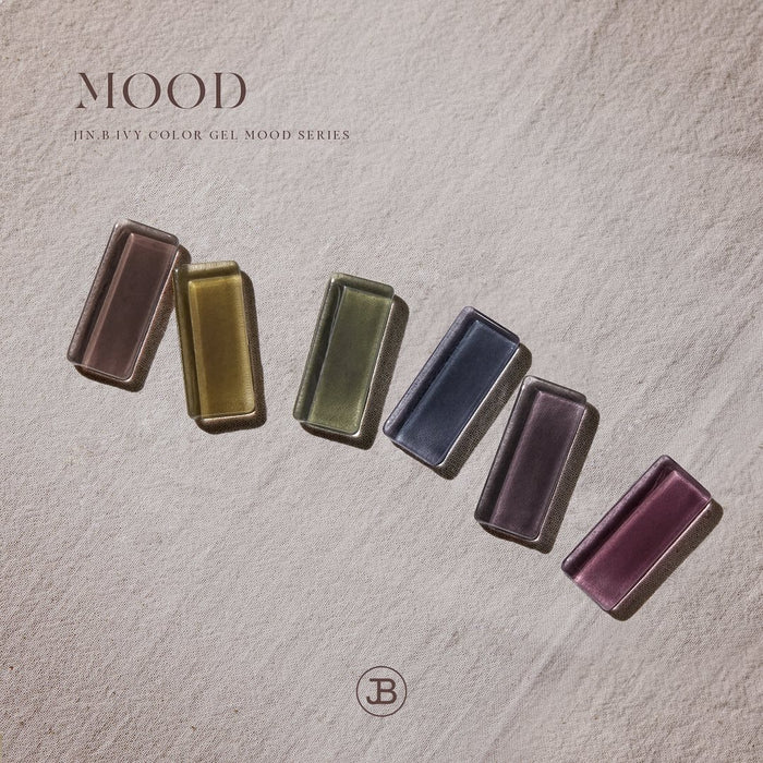 Vintage-inspired 6-piece gel mood collection by Jin.B featuring diverse shades in a stylish bottle design, perfect for capturing different emotions and moods through vibrant colors.