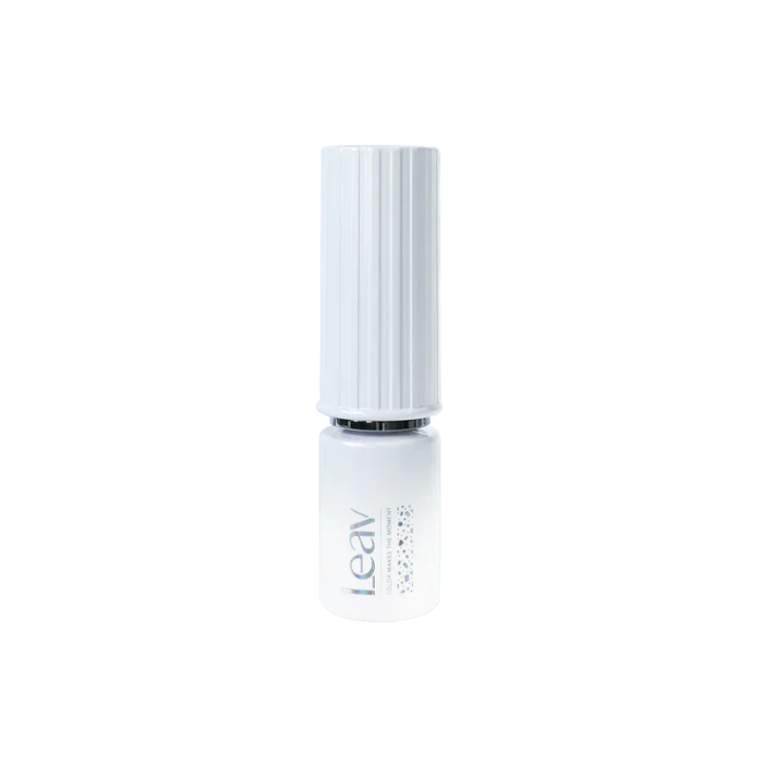 The image depicts a bottle of the LEAV Flake Tiara Collection with 6 Glitter Gels, a product from the LEAV brand. The bottle is white with a silver cap, featuring the LEAV logo and showcasing the iridescent flake glitter gel polish within. This versatile set of 6 glamorous glitter gel polishes is designed to beautifully reflect light, providing a dazzling and eye-catching appearance for any nails.