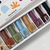 MAYO Picasso Ink 2 Set: Eight vibrant, gel-based nail polish colors in a chic, artistic display. Enriched with natural ingredients, the polishes provide a smooth, long-lasting finish with easy, quick-drying application. This versatile collection allows users to express their creativity and individuality through a range of bold, diverse hues.