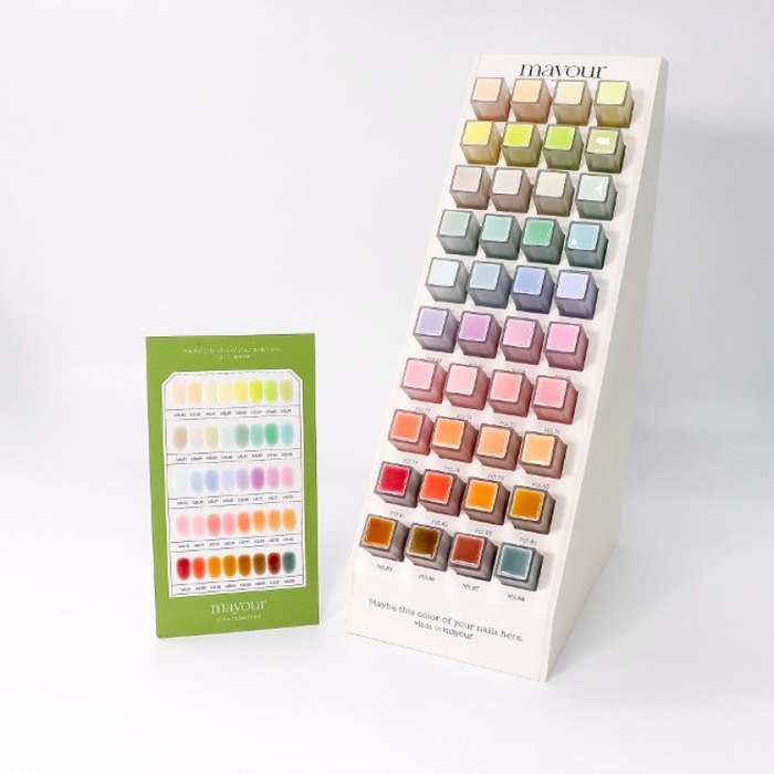 A diverse collection of 40 vibrant, semi-sheer gel nail polish shades from the MAYOUR brand, showcased in an eye-catching display rack and accompanied by a swatch card. This comprehensive set offers versatile application techniques, from subtle ombre effects to full-coverage designs, catering to various creative nail art preferences and seasonal inspirations.