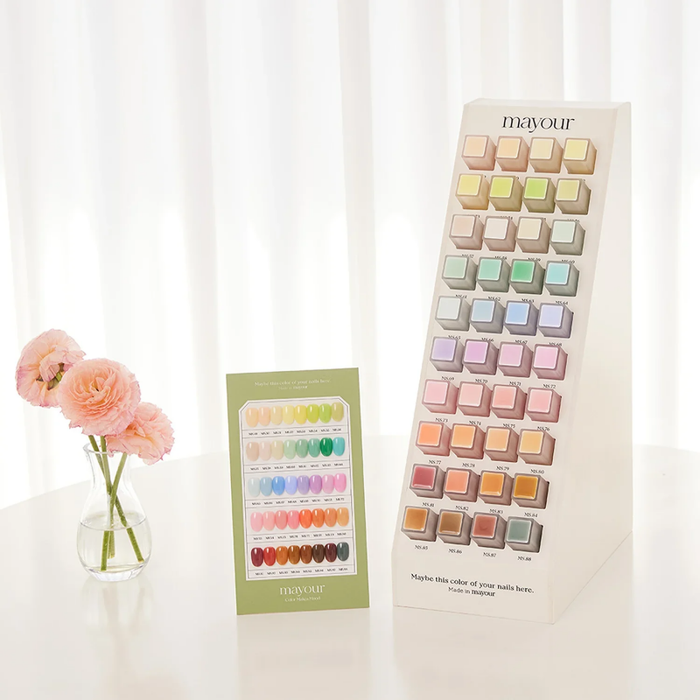 Expansive collection of 40 semi-sheer gel lacquers showcased on a vibrant product display, featuring a diverse range of captivating colors to elevate your nail art creativity and celebrate every season with MAYOUR The Collector Season 2.