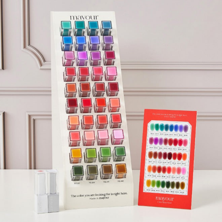 Vibrant collection of nail polish swatches showcasing an extensive range of colors and shades for the MAYOUR The Collector Season 3 gel polish set. The display presents a diverse palette of semi-sheer syrup gel lacquers, allowing for versatile and customizable nail art designs.
