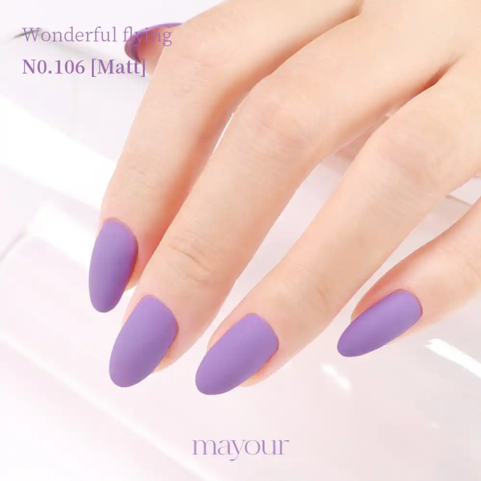 A set of vibrant, opaque purple nail polish bottles and manicured hands showcasing the "Wonderful Flying" nail polish collection from the MAYOUR brand.