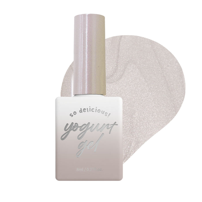 The image depicts a bottle of "Yogurt Bubble Magnet Gel Collection 10pcs/set" by Yogurt Nail, a Shopify product. The bottle contains a pearly white gel polish with a metallic finish, showcasing the versatility of the collection's 10 unique shades. The product description highlights the strong magnetic properties and the silky bright finish, providing an enticing visual representation of the brand's innovative nail care solutions.