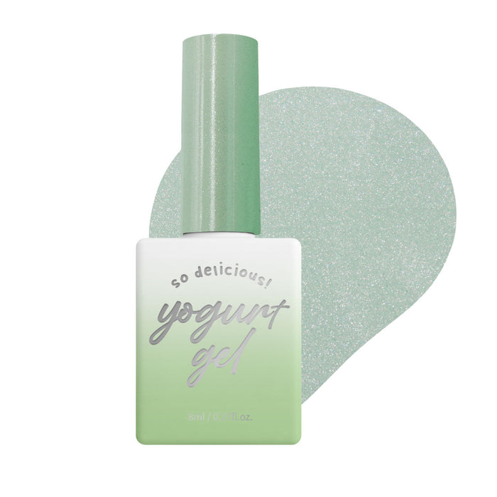 An image of a cylindrical bottle labeled "Yogurt Gel" in a light green and white color scheme, accompanied by multiple circular nail polish shades of various colors including pearl, flower, pink, gold, ash, water, bead, soap bubble, blue, and purple. The alt text would be:

"A collection of 10 unique Yogurt Nail magnetic gel nail polishes in an assortment of silky bright colors and finishes, including pearl, flower, pink, gold, ash, water, bead, 