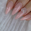 This image showcases a set of elegant, light pink nail designs featuring Nailbayo DOI Aube #03 - a 10ml colored builder gel product from the renowned Korean nail artist Nailbayo. The gel overlay application results in a sleek, glossy finish, accentuated by a single, eye-catching crystal accent nail. This nail art exemplifies the high-quality, HEMA-free Korean nail supplies available through the Nailbayo brand.