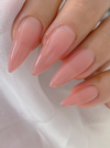 Vibrant and alluring NAILBAYO DOI Nudi Gel Blossom - 10ml showcases elegant, salon-quality nails with its buildable, self-leveling syrup formula. Ideal for professionals and beginners alike, this high-performance Korean nail gel offers a perfect base color for a variety of nail art designs. Crafted by renowned Korean nail artist NAILBAYO, this gel provides an exceptional experience for achieving beautiful, long-lasting manicures.