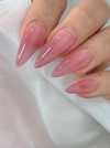 Elegant, buildable mauve gel nail polish by the renowned Korean nail artist NAILBAYO. The image showcases the product's vibrant, self-leveling formula that is perfect for professional and beginner nail enthusiasts alike. The color is an ideal base for a variety of nail art designs, offering a versatile and luxurious finish.