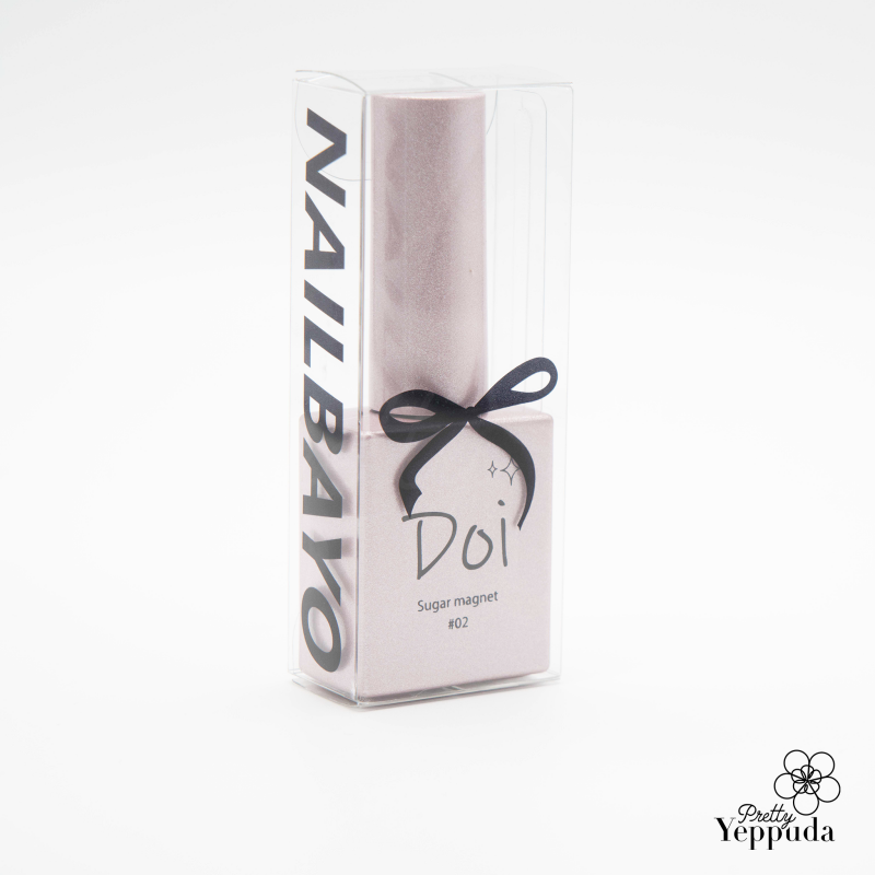 Elegant Nailbayo DOI Sugar Magnet Gel bottle in a sleek transparent box, featuring a black ribbon and minimalist branding. The product's sophisticated packaging showcases the high-quality Korean nail supply, designed by a renowned nail artist for creating stunning magnetic nail art effects.