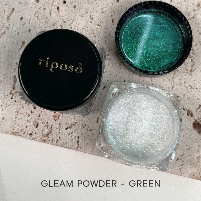Riposo Gleam Powder - Green: This versatile powder effortlessly accentuates depth and offers a range of captivating hues, allowing you to create mesmerizing magnetic designs. Its unique formula enhances the natural glow, providing a seamless, multi-dimensional finish that beautifully complements the Riposo brand.