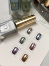 Six individual muted ink bottles from the Riposo Mute Ink Collection, showcasing a range of earthy, metallic hues. The image highlights the elegant packaging and design of this premium Riposo cosmetic brand, featuring a gold-accented bottle and a display of the diverse ink shades available in the set.
