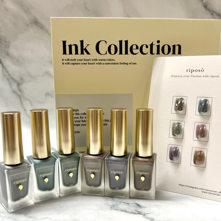 A set of six ink bottles from the RIPOSO Mute Ink Collection, featuring a variety of ink colors presented on a marble background with the RIPOSO brand displayed prominently. The bottles are arranged in a neat, organized manner, showcasing the high-quality, premium nature of the RIPOSO ink products.