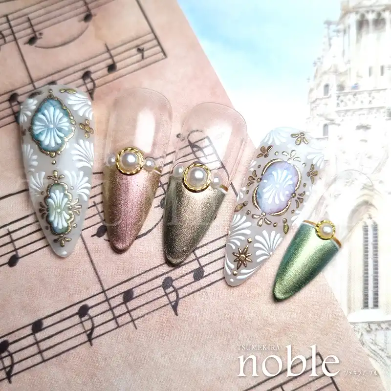 Elegant nail art designs featuring ornate jewelry-inspired embellishments in gold and silver tones, adorned with gemstones and floral motifs, showcased on a musical background, capturing the essence of the Tsumekira NOBLE JEWELRY NO-JEW-101 product.