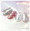 Iridescent diamond-shaped film stickers in vibrant hues, showcasing the Tsumekira brand's Aurora Film Seal Diamond Cut product. The stickers are depicted against a soft, pastel-tinted background, highlighting their prismatic, multi-colored reflections and alluring aesthetic appeal for decorative nail art, accents, and crafting applications.