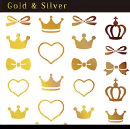 Elaborate alt text: Decorative image featuring a collection of golden and silver crown, ribbon, heart, and bow silhouette icons, showcasing the TSUMEKIRA brand's elegant and regal design elements for their Yuri Joba x Crown product line, highlighting the key features of the intricate gold foil crowns, ribbons, and heart shapes that capture the whimsical and sophisticated aesthetic of the Shopify offering.