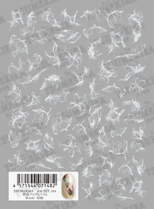 The image depicts intricate, translucent sheets of sheer Japanese paper, ideal for creating subtle and natural-looking nail art. This Tsumekira TETSURO × WASHI WASHI NN-TET-104 product offers a versatile canvas for nuanced nail designs, capturing the delicate beauty of traditional Japanese papercraft.