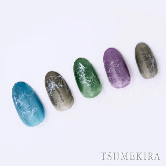Vibrant Japanese nail art stickers featuring the delicate fibers of traditional washi paper, offering a natural, textured look for nuanced or stone-inspired nail designs. The Tsumekira TETSURO x WASHI WASHI NN-TET-104 collection presents a versatile range of earthy, organic hues to elevate your nail art experience.