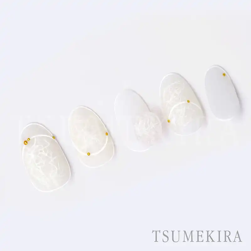 Elegant Japanese nail art stickers featuring a delicate, natural look with sheer fiber of Japanese paper. These Tsumekira TETSURO × WASHI WASHI NN-TET-104 nail stickers are ideal for creating nuanced or natural stone-inspired nail art. The 88mm x 150mm sheet size allows for versatile application and customization.
