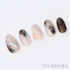 Detailed image of Tsumekira TETSURO × WASHI WASHI NN-TET-104 Japanese nail art stickers featuring sheer fiber of Japanese paper, ideal for nuance or natural stone art effects, showcasing various nail designs in soft, neutral tones with subtle accents.