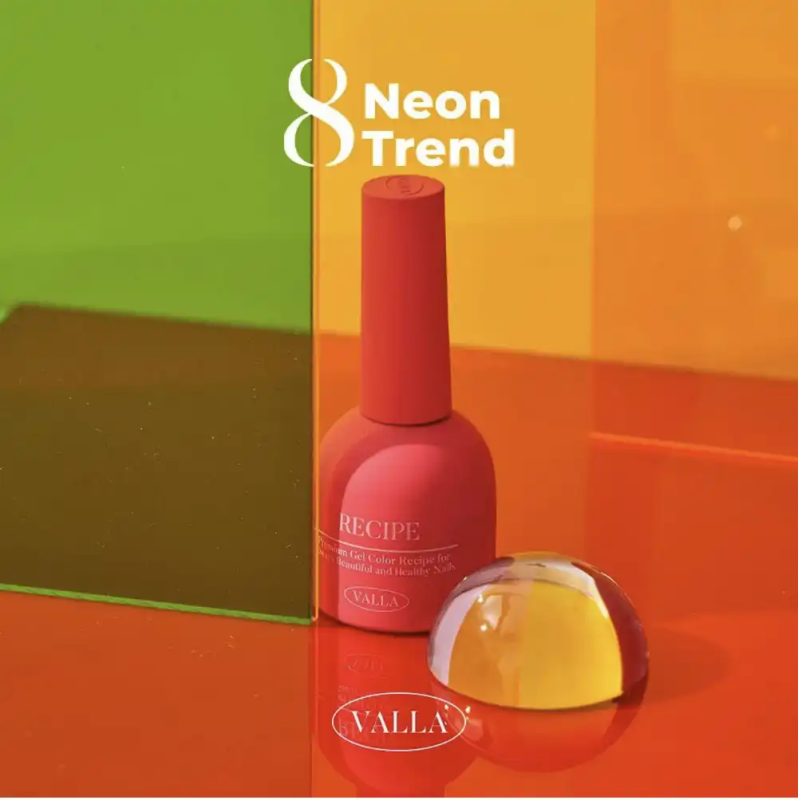 Vibrant and eye-catching image showcasing the VALLA Neon Trend collection of nail gels, featuring a striking red nail polish bottle and a shimmering, translucent gel product against a backdrop of neon orange and green. The bold, trendy colors and modern design effectively highlight the "2024 trend in Korea - neon nails" that this Shopify product aims to capture, inviting customers to "dare to shine" with the VALLA brand.