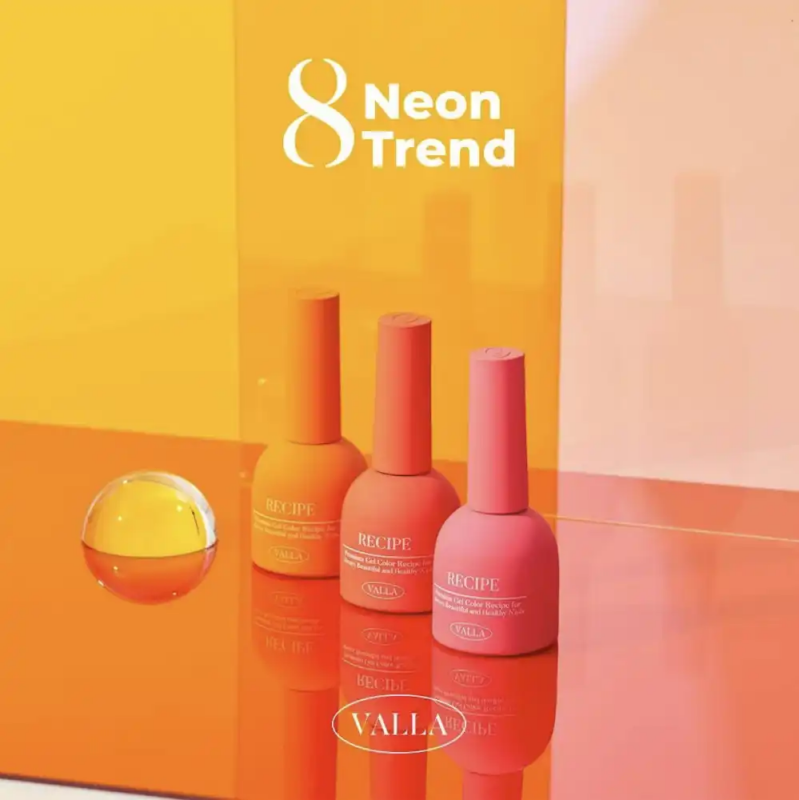 A vibrant display of neon-colored nail polish bottles and an orange globe, showcasing the 2024 Korean neon nail trend featured in the VALLA Neon Trend collection. The collection offers 8 vivid shades, available as a set or individually, with a quick 1-2 minute curing time under UV/LED light.