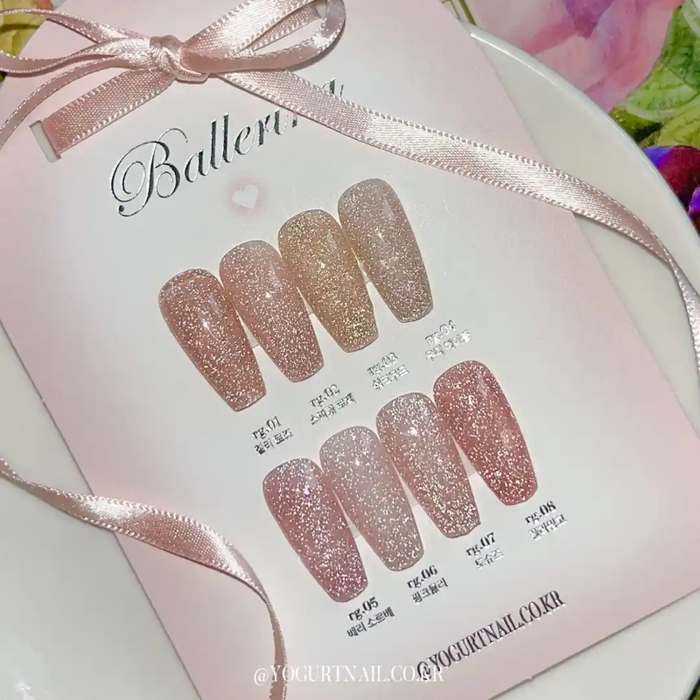 Elegant pink glitter nails from the Yogurt Ballerina 1 Collection, showcasing the reflective, self-leveling gel polish shades that perfectly match the soft, feminine tone of ballet-inspired nails. This versatile and on-trend nail product line from the Yogurt brand offers a high-quality, professional-looking manicure experience.