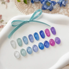 Elegant iridescent nail polish colors in shimmering shades of blue, green, pink, and white, showcasing the vibrant Ballerina 2 Collection by the Shopify brand, YOGURT.